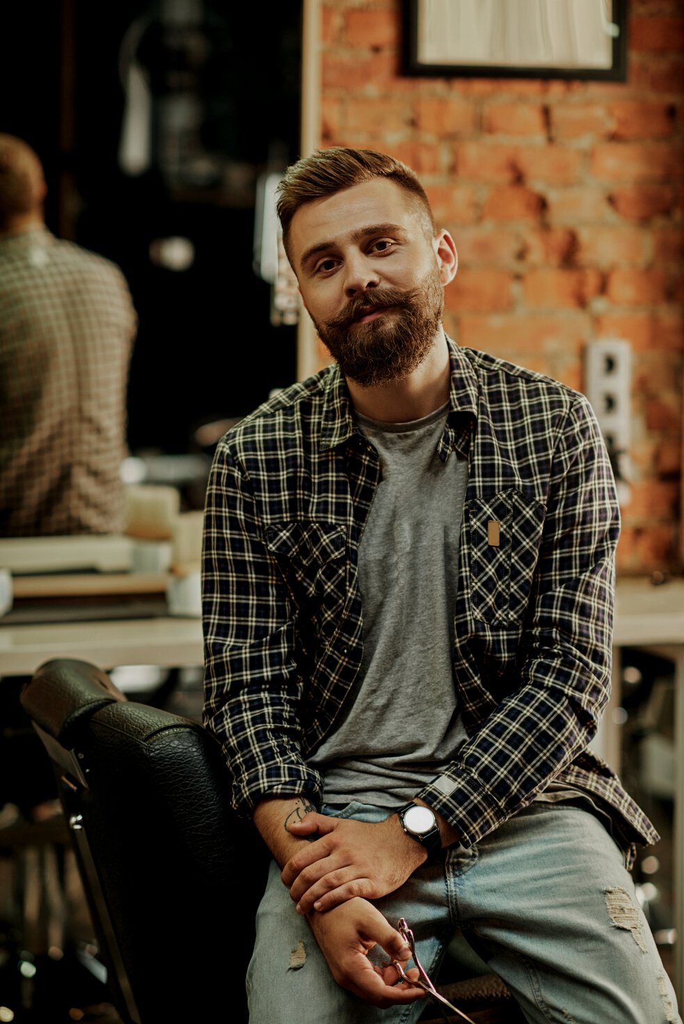 Barber portrait in vintage barber shop